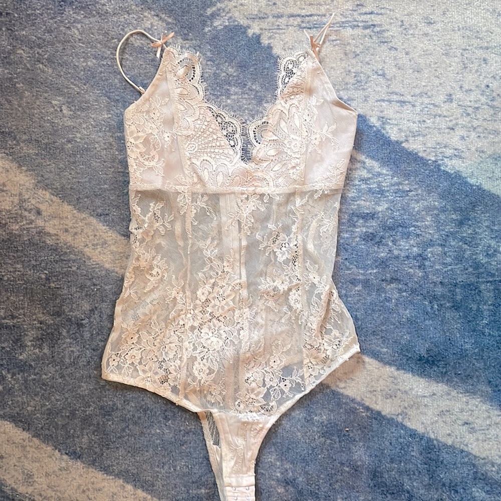 Chrissy Teigen x revolve bodysuit in nude/tan. Lace detail. Great condition